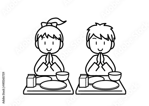 給食を食べた子供　白黒