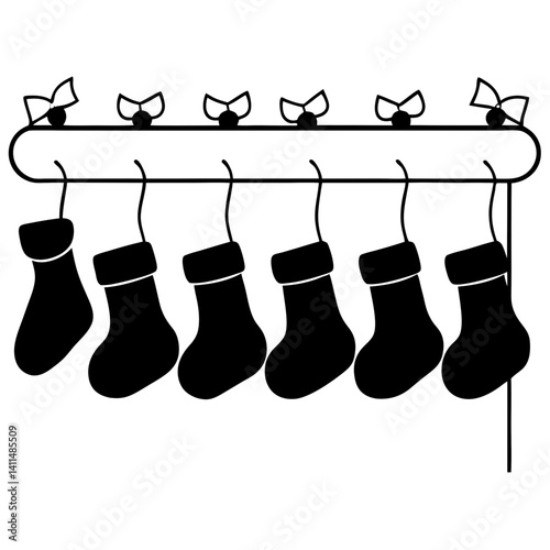silhouette of Christmas stockings hanging on a mantelpiece 