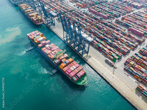 Aerial view of Manufacturing logistics cargo container ship at ship port.export import business logistic international.