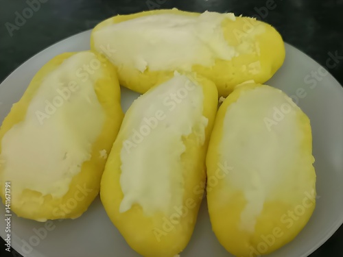 Photography Delicious Bengali Chum Chum topped with rich malai! Soft, juicy, and full of flavor – a must-try Indian sweet that melts in your mouth