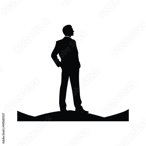 Businessman looks upon the sky silhouette