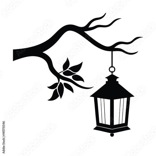 Silhouetted lantern hanging from a tree branch