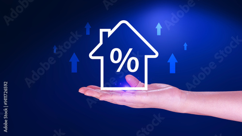 Real estate property investment concept, Asset management, Interest rates, inflation, loan mortgage, increase tax. Hand holding house icon with percent and rise arrow.
