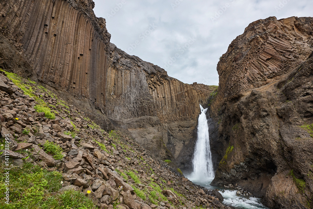 Litlanesfoss waterfall and basaltic rocks. Lagarfljot area. East fjords. Iceland