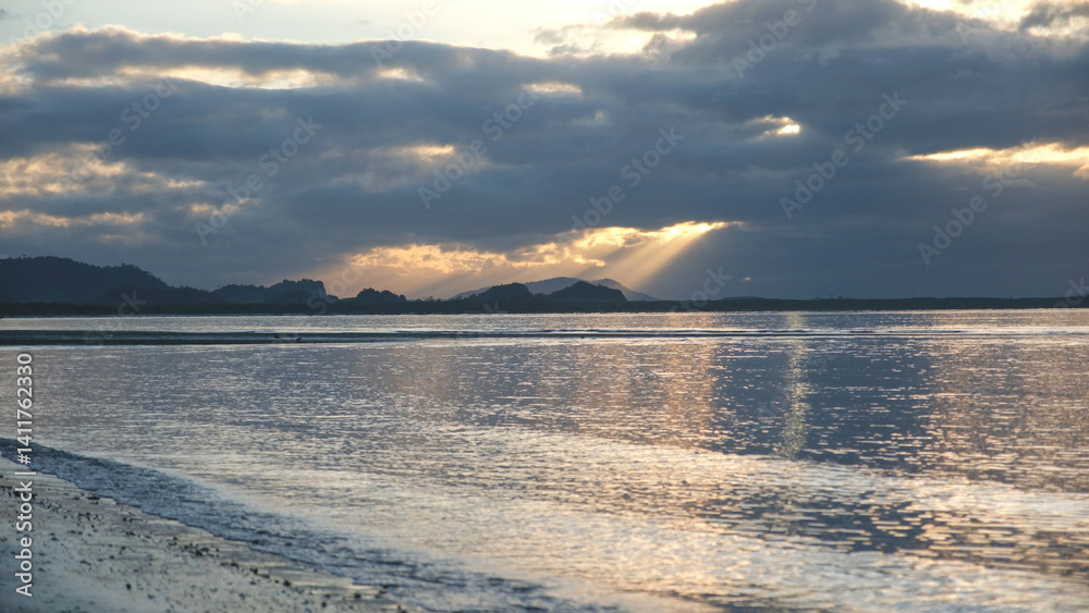 Landscape image of the sea and a beautiful sunrise sky
