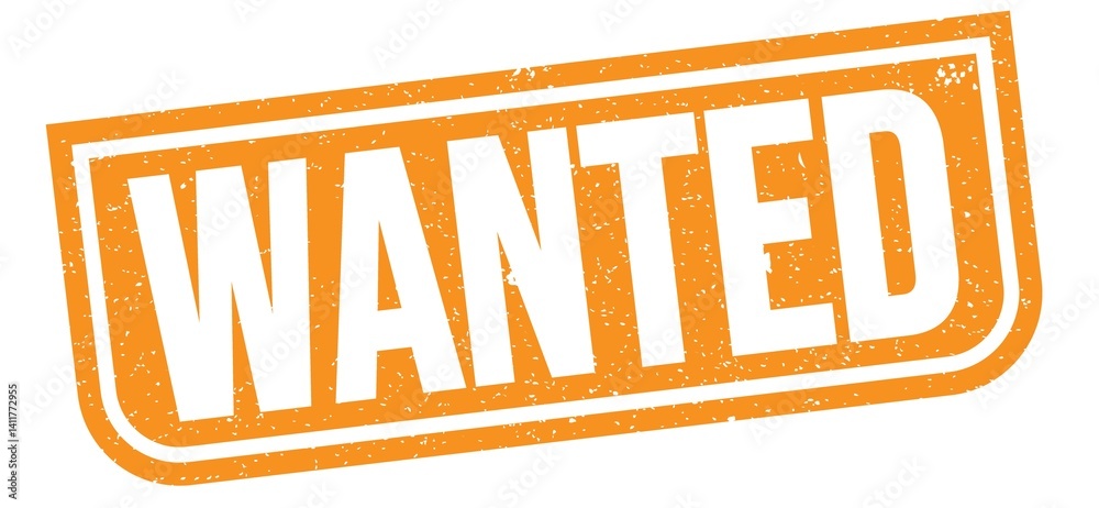 WANTED text written on orange stamp sign.