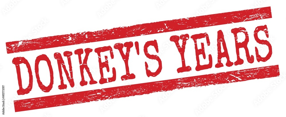 DONKEY'S YEARS text on red lines stamp sign.