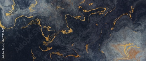  black, grey, and gold. Perfect for creating a luxurious and elegant background for design.