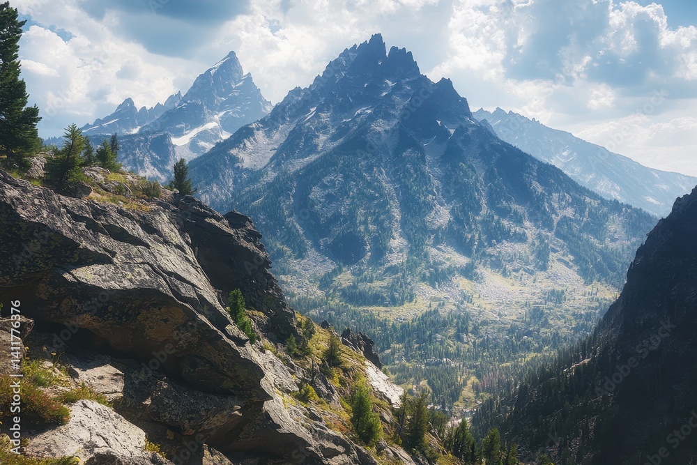 Naklejka premium Cliff Ledge at Grand Teton National Park: Rock Climber on Granite Cliff Overlooking Cascade Canyon