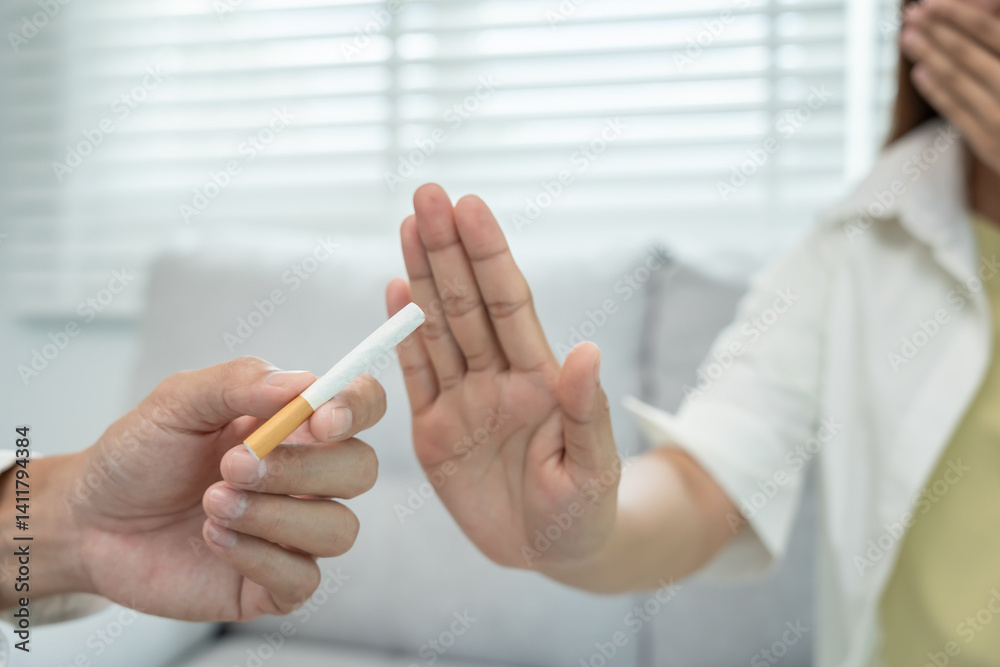 Obraz premium No smoke. woman cover nose due to cigarette smoke smell, refuse, reject, break, say no, quit smoking for health. world tobacco day. drugs, Lung Cancer, emphysema , Pulmonary disease, nicotine