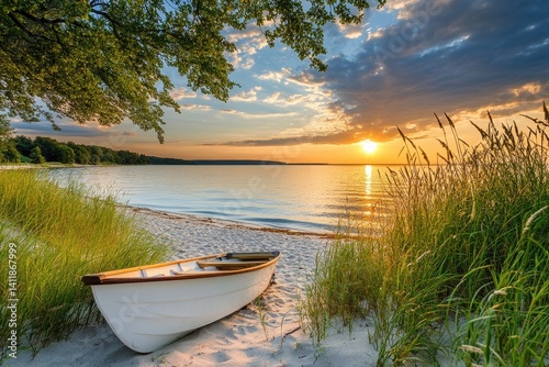 Serene sunset beach scene with small boat