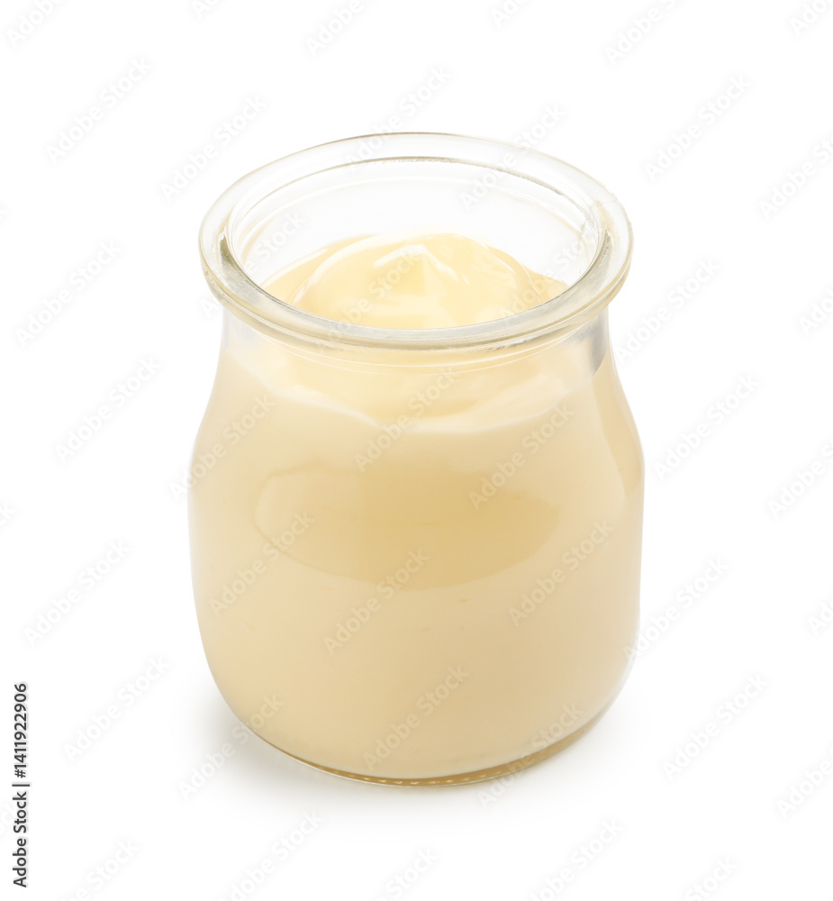 Tasty vanilla pudding in jar isolated on white Tasty vanilla pudding in jar isolated on white