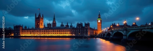 Dusk illuminates the Houses of Parliament and bridge Dark blue sky contrasts with warm lights , sunset, twilight, houses of parliament