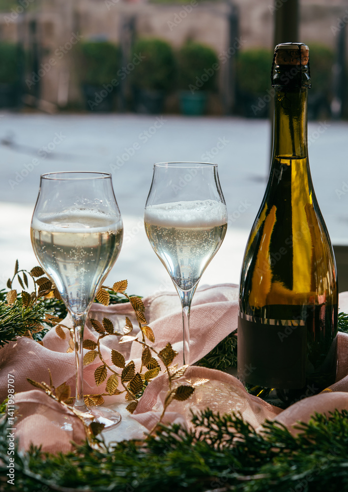 Sparkling wine served for a celebration in a bar or a restaurant.
