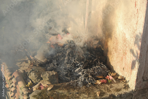 Burning dry leaf waste in a kiln results in quite a lot of smoke