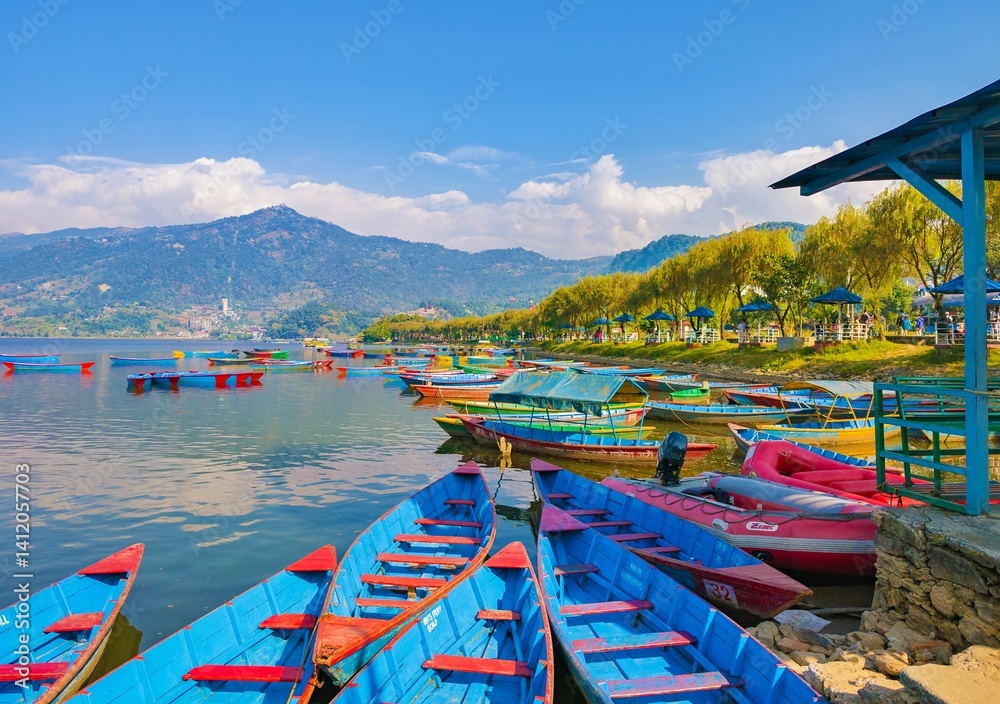 Himalayas, Nepal - The famous hiking on the roof of the world called Annapurna Circuit in the Himalaya range mountain, with little village, buddhist stupa and mountains of 8000 meters.