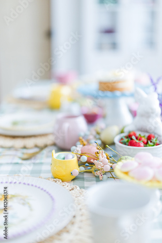 Easter table set up with yellow chick cups