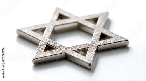 Close-up of the Star of David made of brushed metal on a white background, symbolizing Jewish faith, heritage, spirituality and tradition in a minimalist style

