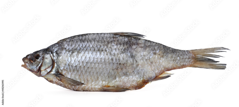 One dried salted roach fish isolated on white One dried salted roach fish isolated on white