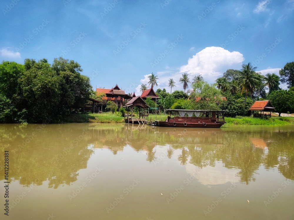 Fototapeta premium Thai style house by the river