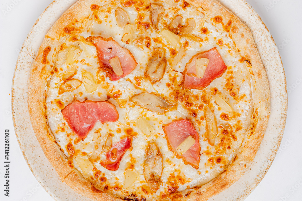 Savory pizza with golden melted cheese, juicy ham, and tangy pineapple pieces delights the senses