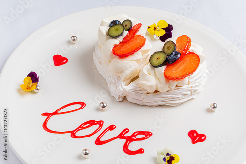 Obraz na płótnie A beautiful dessert with cream, fresh fruit, and decor expressing love w salonie