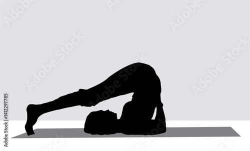 Silhouette of a girl demonstrating yoga movements. A woman figure doing yoga fitness exercises.