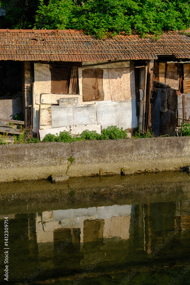 Old buildings along the canal Martesana at Milan, Italy