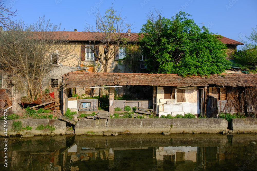 Old buildings along the canal Martesana at Milan, Italy