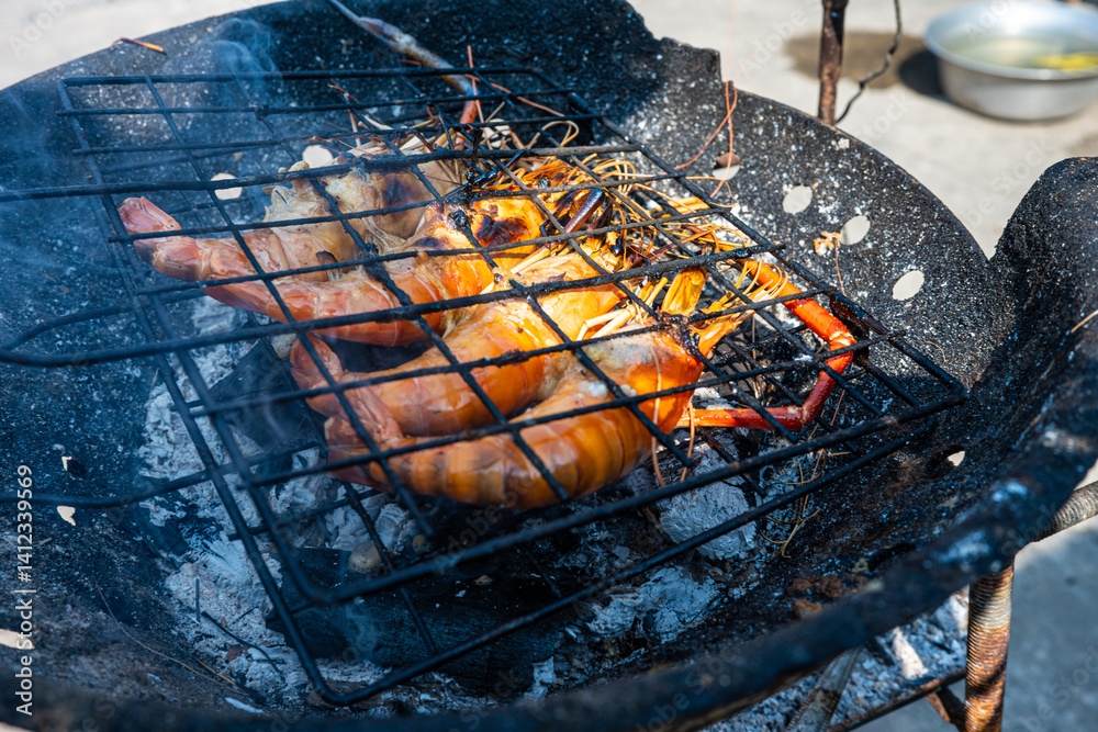 Big river prawn shrimp grilled on fire with smoke