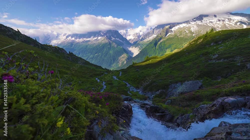 4k Video of Snowy Mountain Stream Flowing Through Lush Bushes Under White Clouds in Time Lapse 4k Video of Snowy Mountain Stream Flowing Through Lush Bushes Under White Clouds in Time Lapse
