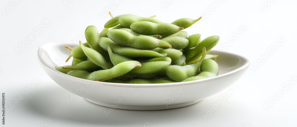 Fresh edamame in white bowl, vibrant green and healthy, perfect for snacking or adding to dishes. Enjoy nutritious benefits