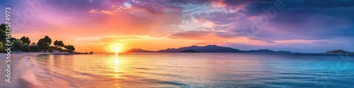Magnificent sunset over the turquoise sea with vibrant colorful clouds