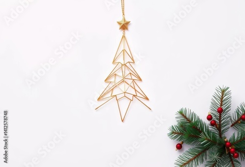Sleek, metallic gold geometric Christmas tree ornament on white background, contemporary, bright