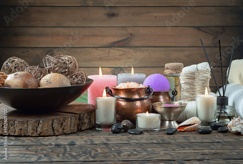 Obraz na płótnie Spa treatment with candles and towel on wooden table, closeup w salonie