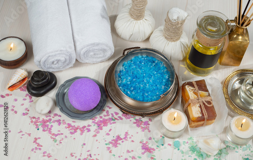 Obraz na płótnie Spa treatment with candles and towel on wooden table, closeup w salonie