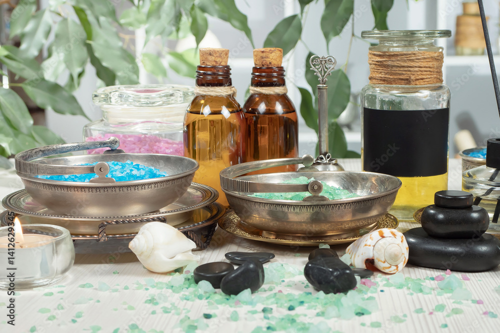 Spa treatment with candles and towel on wooden table, closeup