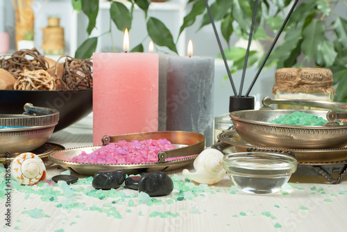 Obraz na płótnie Spa treatment with candles and towel on wooden table, closeup w salonie