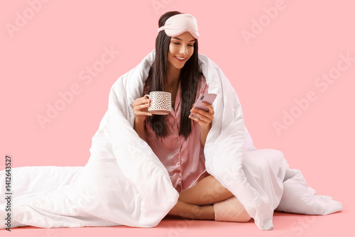 Young happy woman with cup ...