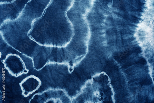 tie dye pattern hand dyed on cotton fabric abstract texture background.