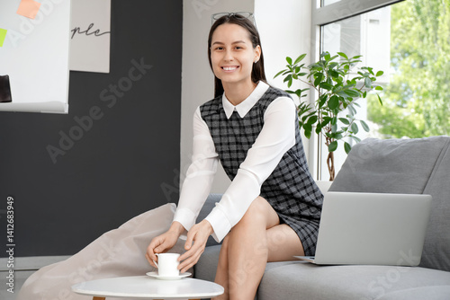 Young happy woman with mode...
