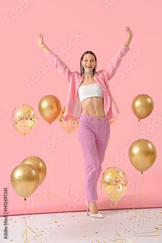 Excited young woman celebra...