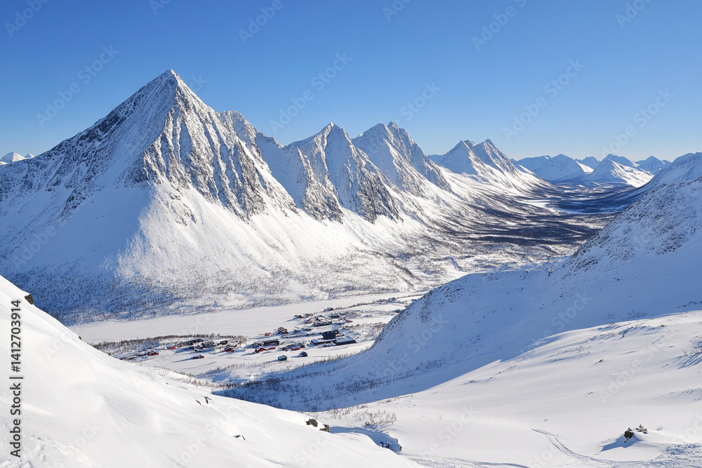Fototapeta premium Stunning view of snow-covered mountains in the Arctic during bright winter day with clear blue sky