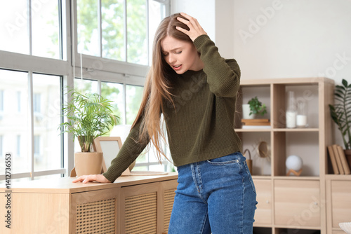 Young woman having panic at...