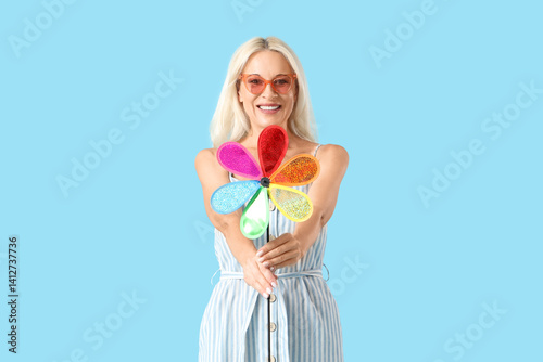 Mature woman in sunglasses ...