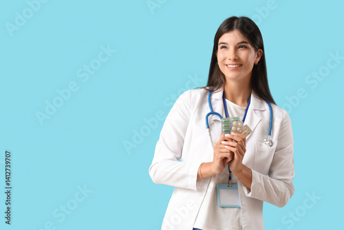 Young female doctor with di...