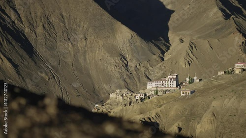 4K footage of the unique moon-like scenery in Lamayuru Moonland, Kargil Ladakh, India, highlighting a monastery and the expansive dry desert terrain.