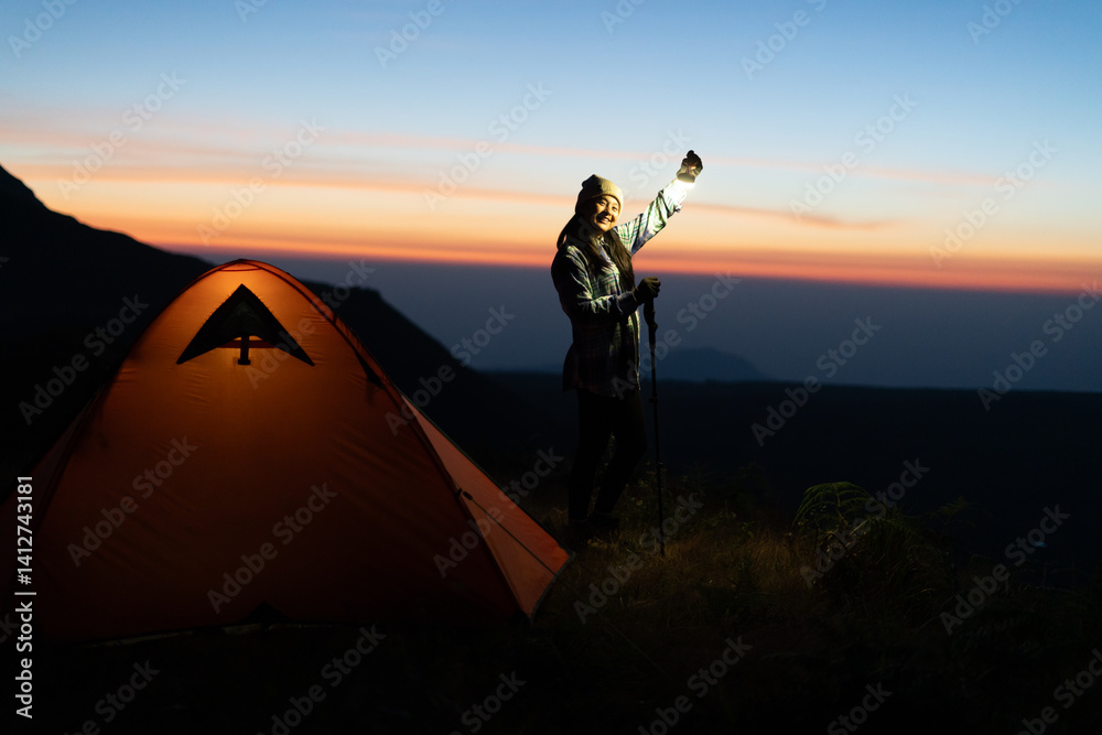 Adventurous camping in mountain wilderness at sunset outdoor experience scenic viewpoint