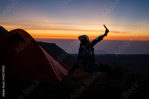 Obraz na płótnie Captivating sunset selfie at camping site adventure travel outdoor photography vibrant landscape w salonie