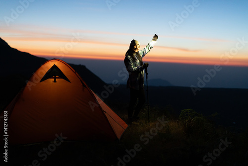 Obraz na płótnie Adventurous camping in mountain wilderness at sunset outdoor experience scenic viewpoint w salonie